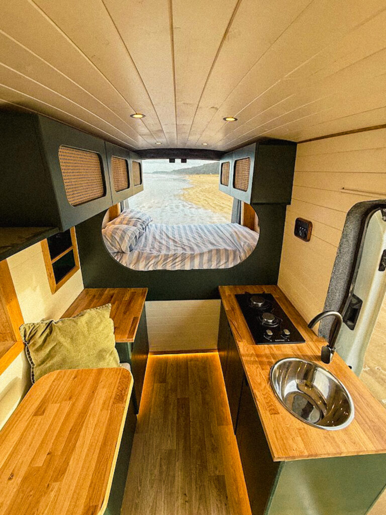 Cozy campervan interior with kitchen