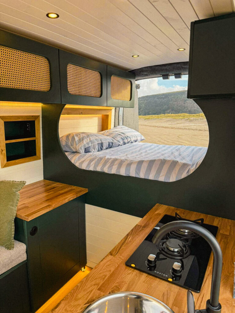Cozy campervan interior with bed