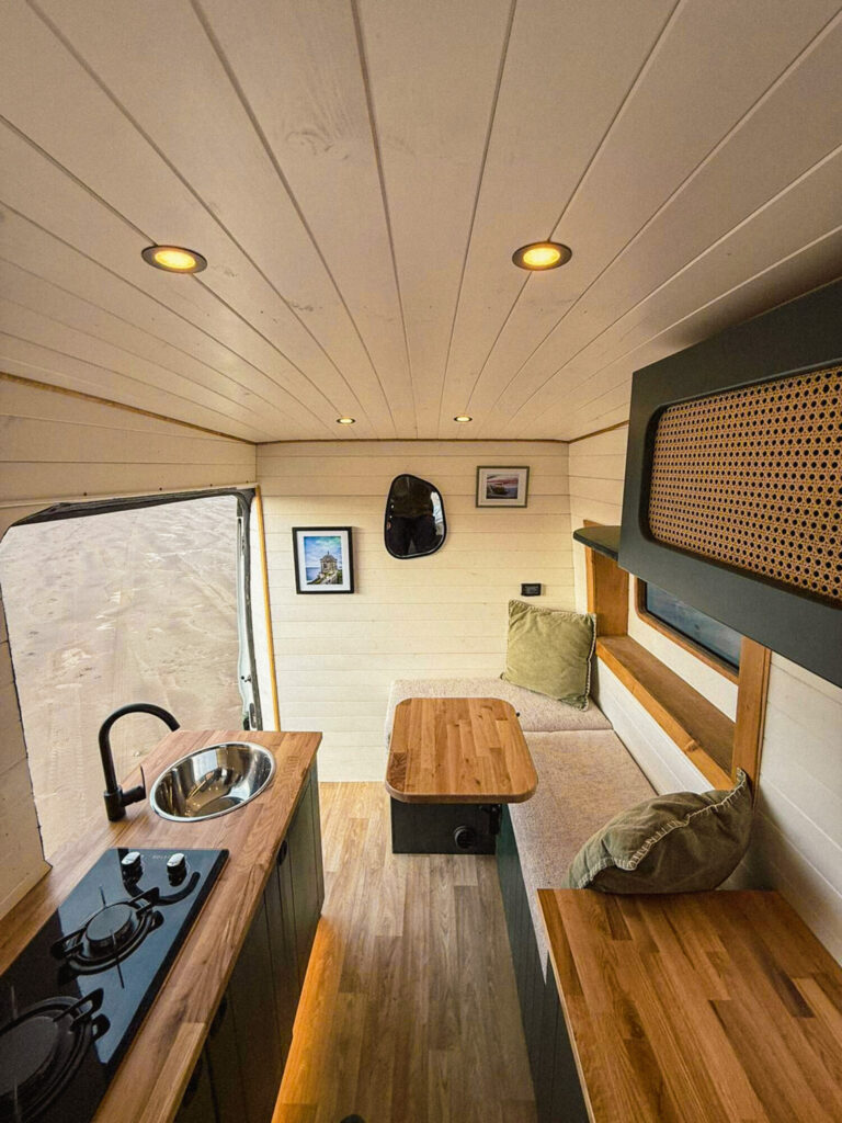 Cozy campervan interior with kitchenette