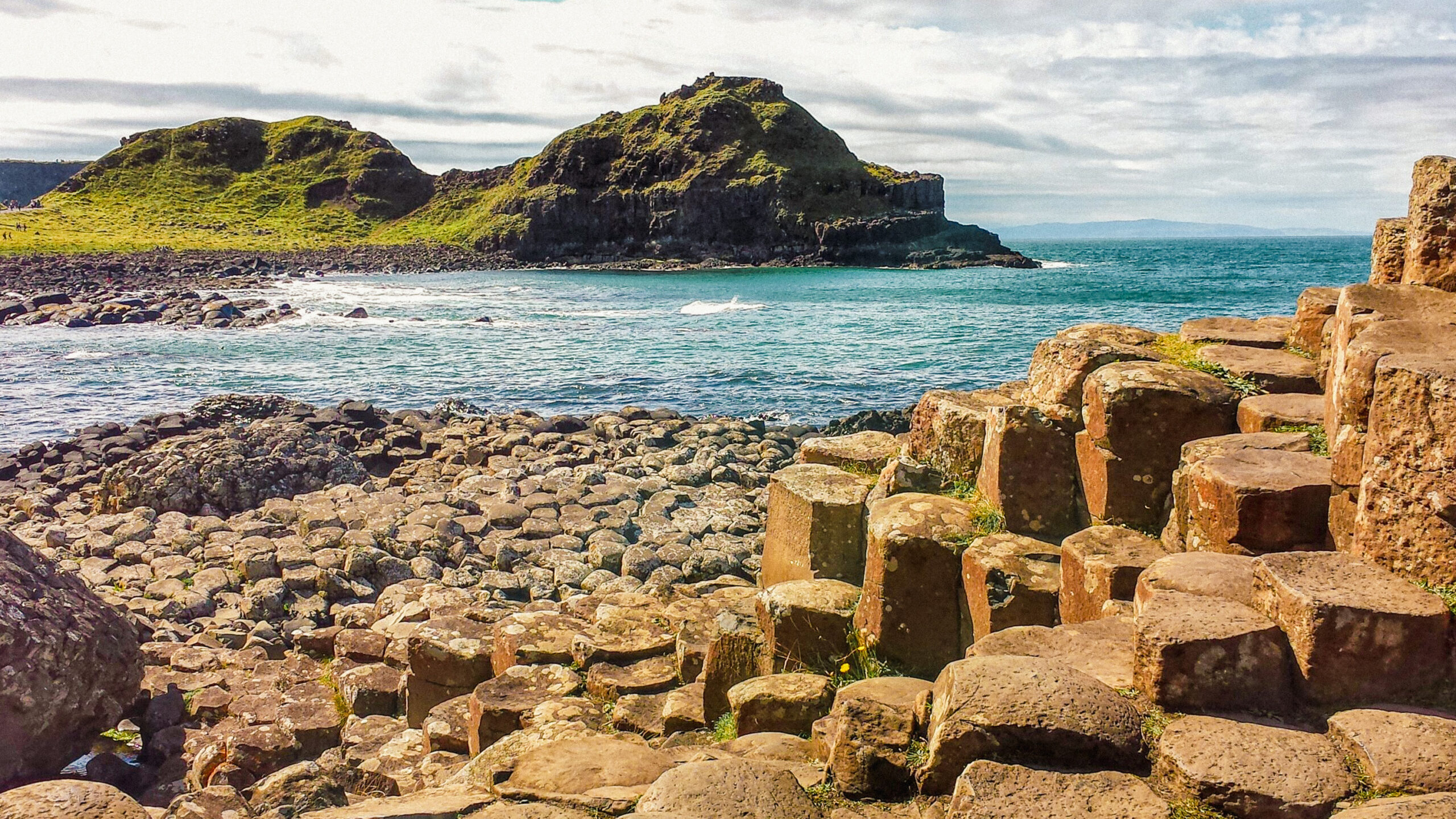 Rocky coastline with hexagonal formations