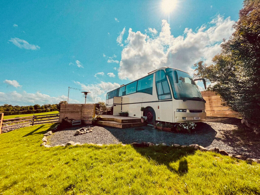 Vintage campervan in scenic landscape.