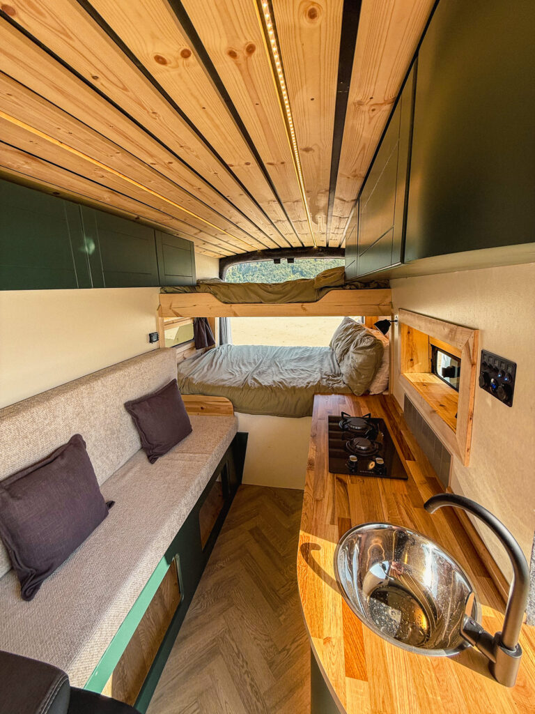 Cozy campervan interior with kitchen