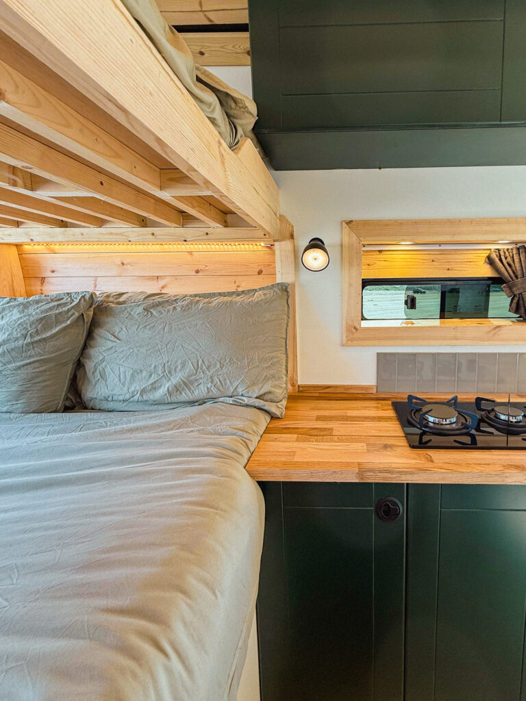 Cozy campervan interior with bed