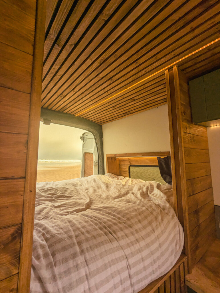 Cozy campervan interior with bed