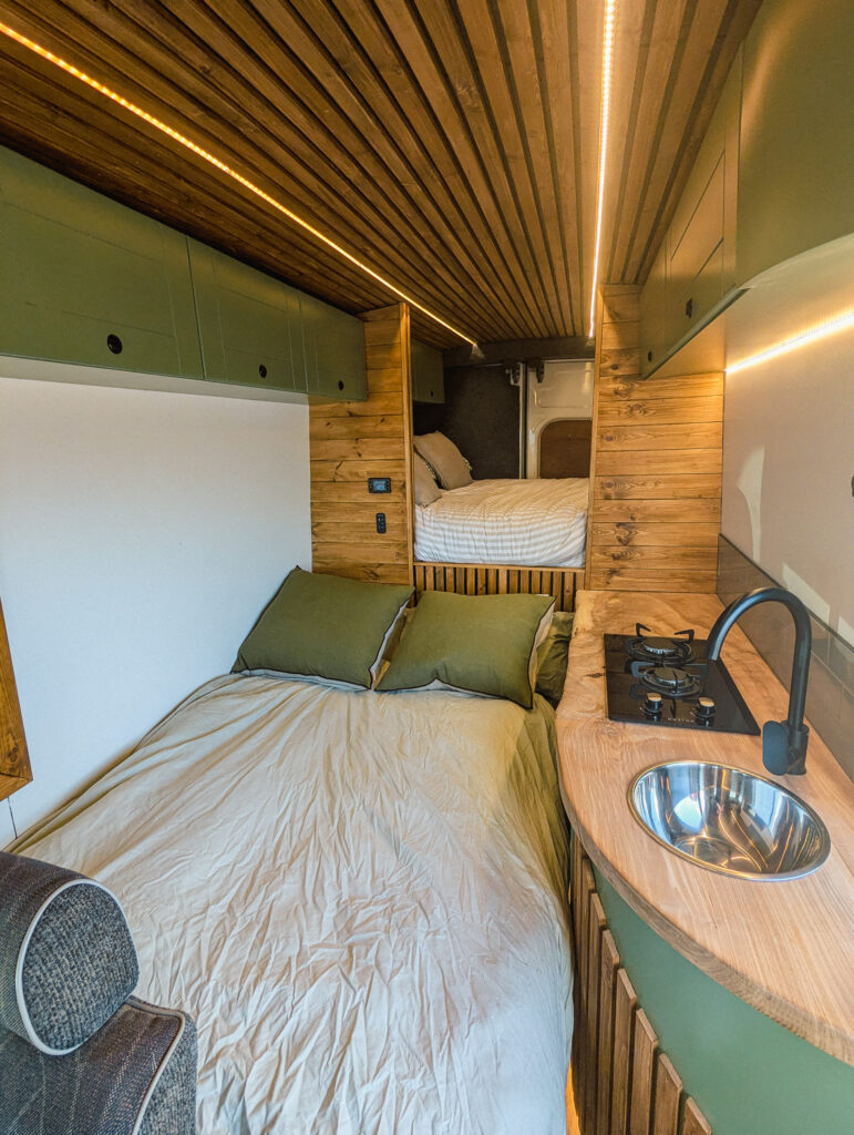 Cozy campervan interior with bed