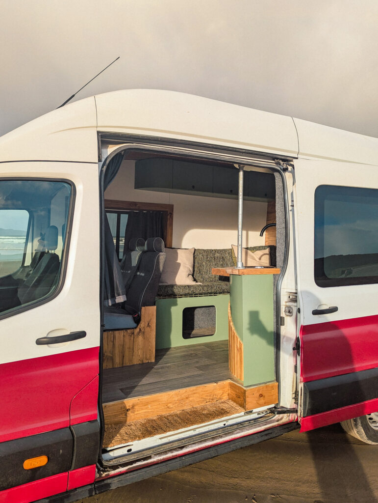 Campervan interior with open door