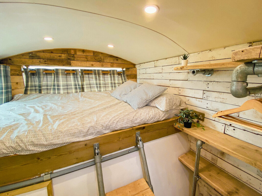 Cozy campervan interior with bed
