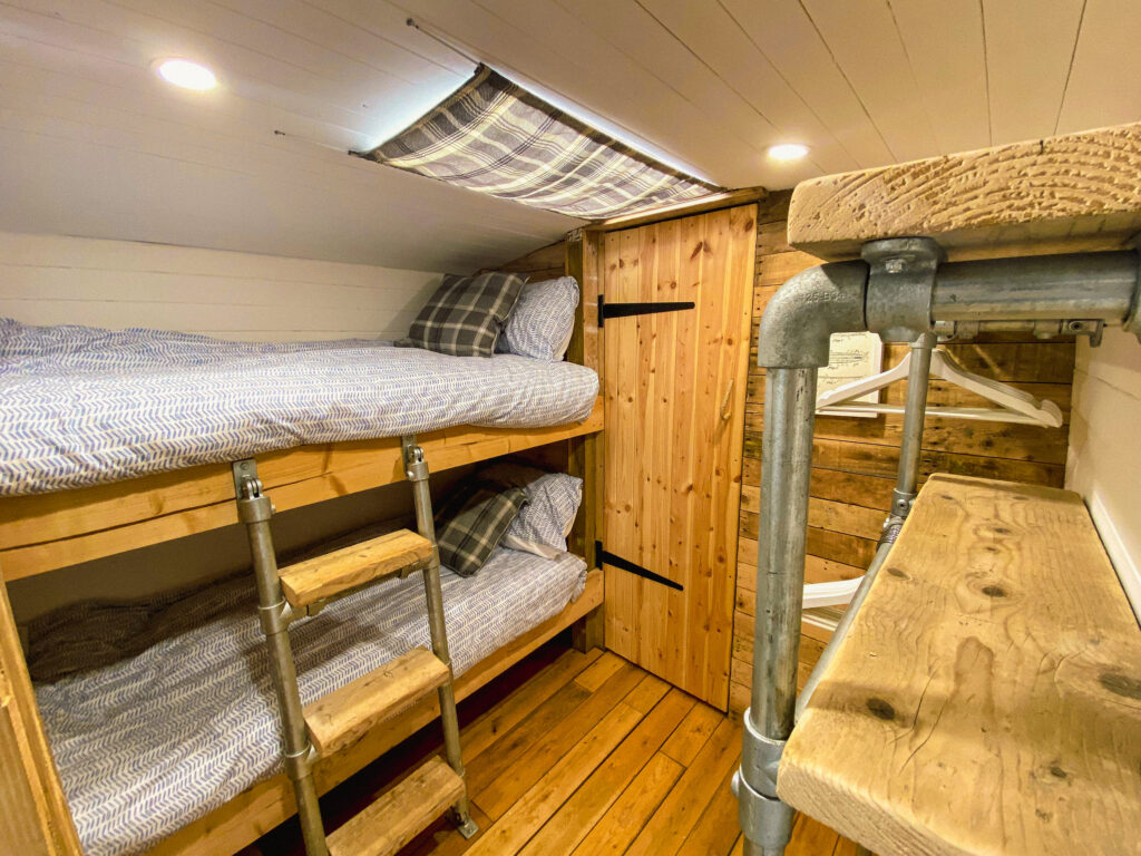 Cozy bunk beds in rustic interior