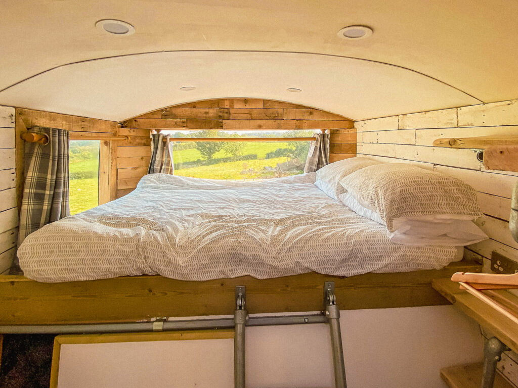 Cozy campervan interior with bed