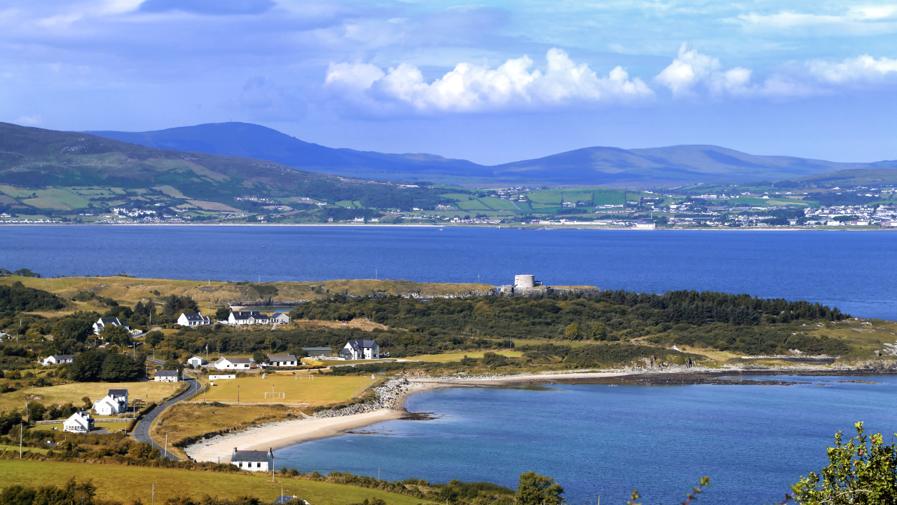 Sandy cove and shoreline overlooking Lough Swilly.