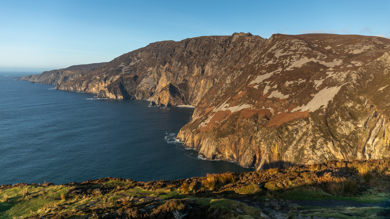Steep, rust-coloured cliffs rising above the Atlantic at Sliabh Liag.